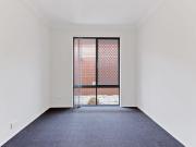 LOW MAINTENANCE MODERN HOME WITH AIR CON AND DOUBLE GARAGE