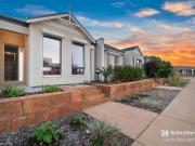 Low Maintenance & Peacefully Positioned!