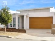 LOW MAINTENANCE WITH MODERN LIVING