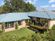 LOW SET BRICK HOME FLOOD FREE LOCATION!