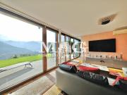 Lugano: Appartamento con terrazzo e giardino vista lago,...