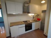 Luminoso appartamento con ampio balcone e comfort moderni