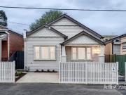 Luxe living Californian behind iconic Lygon Street