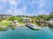 Luxuriöse Gartenwohnung in direkter Seelage