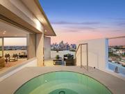 Luxurious north facing sky home with panoramic city views