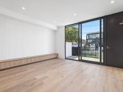 LUXURY 3 STOREY TOWNHOUSE IN THE HEART OF MCKINNON...