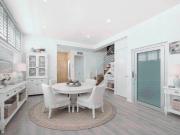 LUXURY BEACHSIDE RESIDENCE WITH PANORAMIC SKYDECK VIEWS