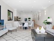 Luxury Coastal Living Meets Designer Perfection in the...