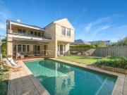 LUXURY LIVING WITH POOL, STUDIO AND WALK TO BEACH LOCATION