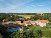Maison 10 pièces 455 m²
