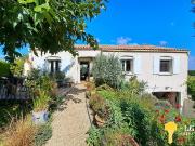 Maison 157m2, belle véranda, jardin et grand garage...