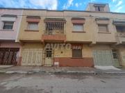 Maison 2 façades avec jardin et garage