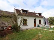 Maison 4 Chambres avec Garage et Jardin