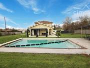 Maison 4 chambres terrain 1970 m² avec piscine creusée