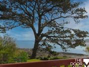 Maison en bord de mer avec jardin