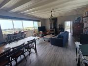 Maison en bord de mer avec jardin