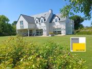 Maison en bord de mer avec jardin