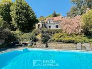 Maison 8 pièces 256 m²