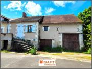 Maison a restaurer + jardinet + grange + parcelle