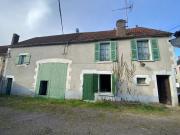 Maison ancienne édifiée sur cave avec dépendances