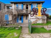 Maison année 30 proche commerces avec terrasse et terrain