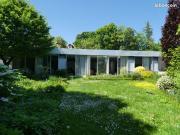 Maison atypique des années 80 sur beau terrain plat 1000m2