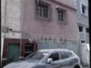 Maison avec 2 magasins