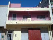 Maison avec grand garage et jardin