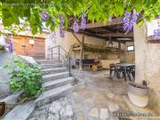 Maison avec jardin et terrasse couverte