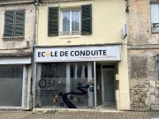 Maison avec local commercial loué et un appartement à Neuill