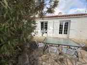 Maison en bord de mer avec jardin