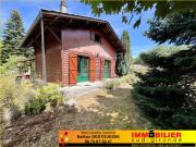 Maison bois de type chalet avec garage
