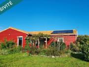 Maison bois éco performante avec quasi autonomie électrique