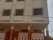 Maison commerciale double façade