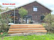 Maison dans cadre verdoyant