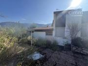 Maison d'architecte avec vue sur les montagnes