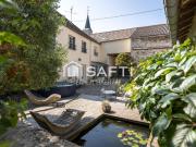 Maison de 200m2, 8 pièces, 4 chambres terrain de 570m2