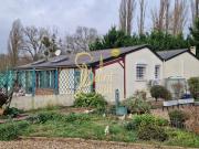 MAISON DE PLAIN PIED 2 CHAMBRES GARAGE ET TERRAIN