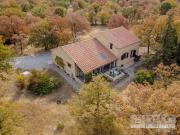 Maison de plain pied avec grand jardin et garage