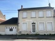 Maison de ville avec garage et jardin