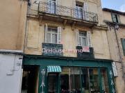 Maison de ville en pierre, local commercial et habitation