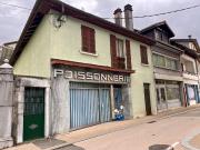 Maison de ville mitoyenne avec une partie à usage...