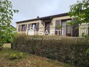 Maison économe en énergie au coeur d'un cadre verdoyant