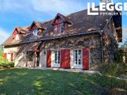 Maison élégante et spacieuse avec loft, garages et vue...