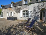 Maison en bord de mer avec jardin