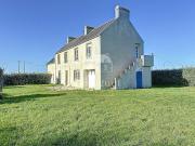 Maison en bord de mer avec jardin