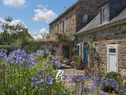 Maison en bord de mer avec jardin