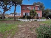 Maison en bord de mer avec jardin