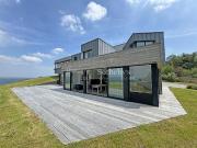 Maison en bord de mer avec jardin