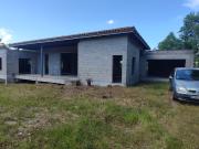 Maison en cours de construction, située sur un terrain...